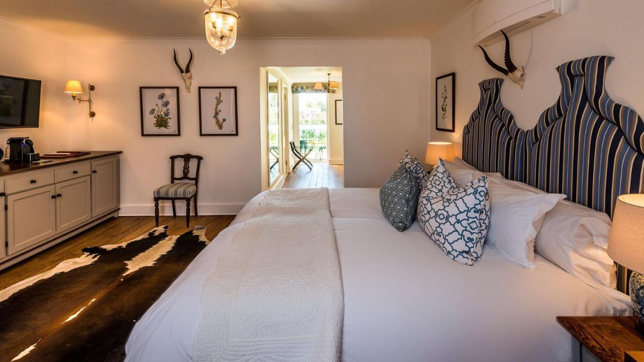 Drostdy Hotel by NEWMARK Graaff-Reinet Exteriér fotografie A bedroom at the Oyster Box