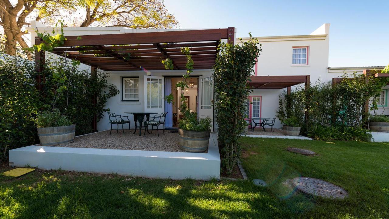 Drostdy Hotel by NEWMARK Graaff-Reinet Exteriér fotografie A pergola in a garden